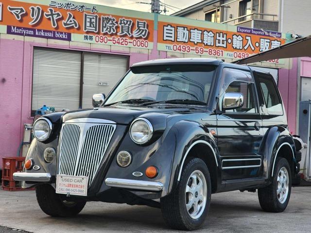 Ref:AUX-17948956 MITSUBISHI PAJERO JR 1998 1 1998 Mitsubishi Pajero Jr black gasoline used car Japan export