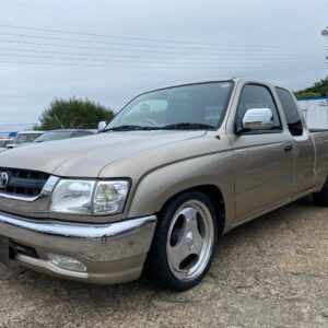2003 Toyota Hilux Sports Pick Up gold gasoline used car Japan export